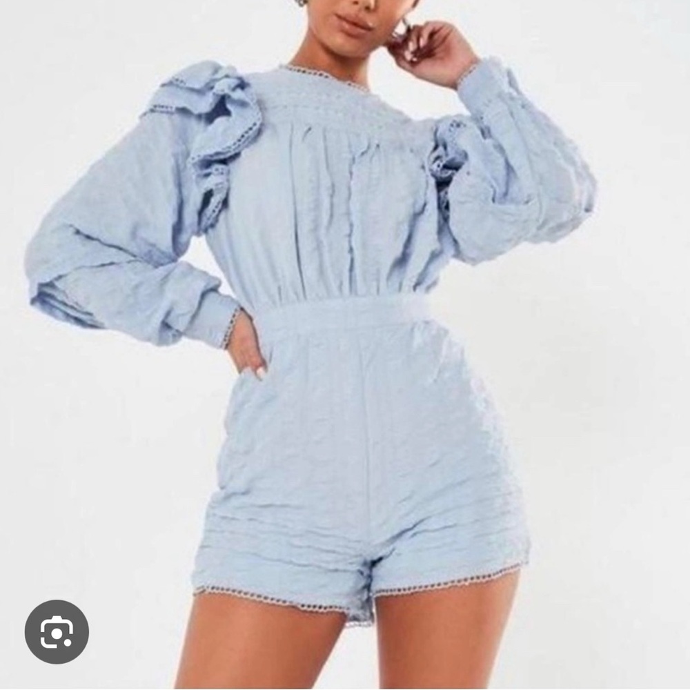 Misguided Frill Sleeve Blouson
Sleeve Playsuit Blue - size 4.